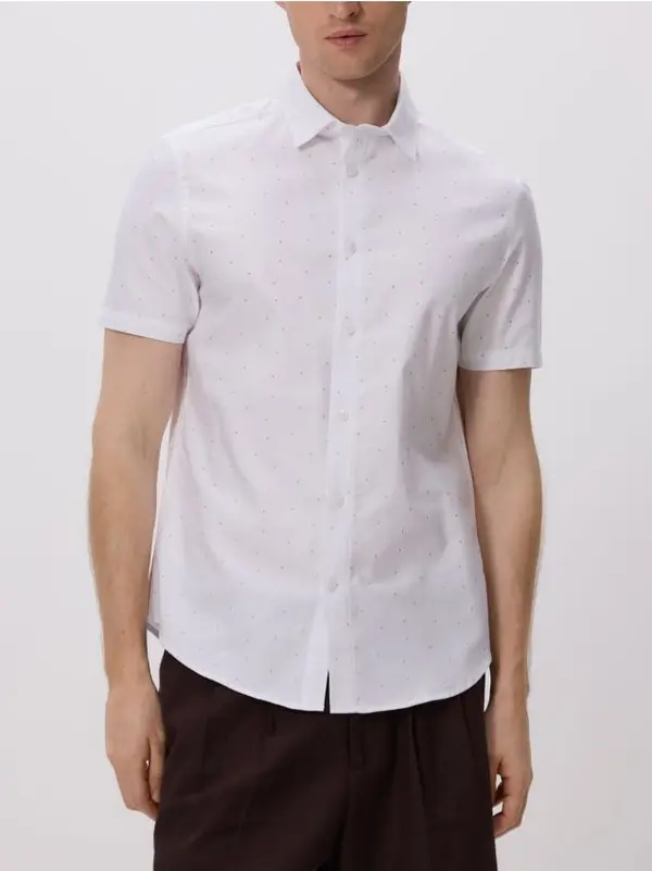 Reserved Reserved - Slim fit pamučna košulja - bijela