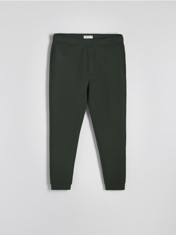 Reserved Reserved - Slim sportske hlače - tamnozeleno