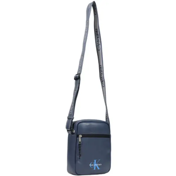 Calvin Klein Jeans Calvin Klein Jeans  Torbe za nošenje preko tijela BOLD LOGO WEBBING REPORTER LV04D3418G  Calvin Klein Jeans